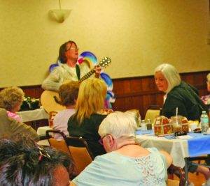 Michelle Muth of M3 Music Therapy demonstrates how music can relieve stress.