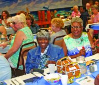 Gwen Bazmore and Vineda Martin of Aliquippa enjoy the luncheon.