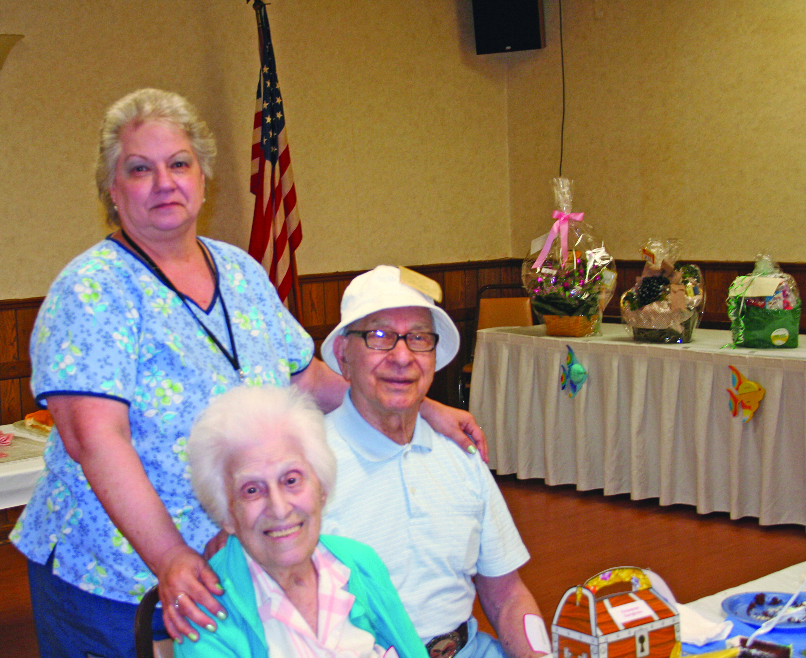 Anthony and Elda Lamia with caregiver Pam Bystry.