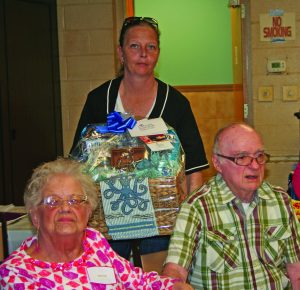 Albert and Helen Roll with Aide, Brandy.