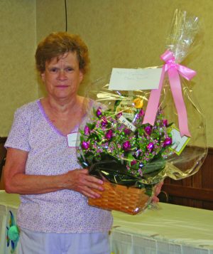 LuJane Bedekovich receives a basket.